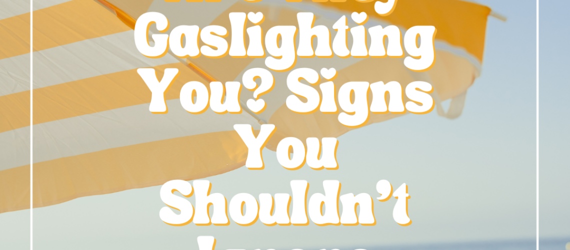 A yellow and white striped beach umbrella stands against the sea and sky backdrop. Bold white text asks, "Are They Gaslighting You? Signs You Shouldn't Ignore." The image is framed with a subtle grid pattern, inviting introspection beneath its calming hues.